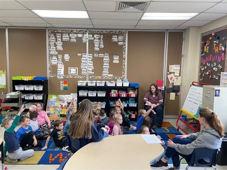 FFA members reading to elementary students 