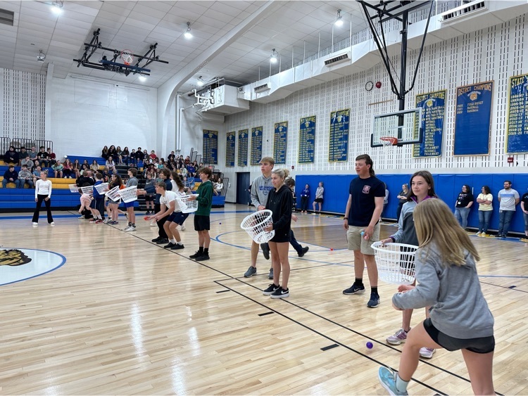 Students in grades 6-12 participating in a team game 